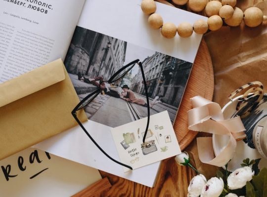 a book and a glass of wine